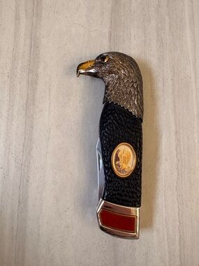 Eagle-Head Folding Knife with Black Handle and Gold Accents